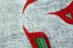 Street art. Abstract background image of a fragment of a colored graffiti painting in chrome and red tones photo