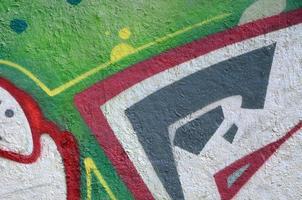 Street art. Abstract background image of a fragment of a colored graffiti painting in chrome and red tones photo