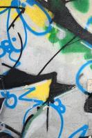 Street art. Abstract background image of a fragment of a colored graffiti painting in chrome and blue tones photo