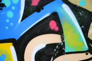 arte callejero. imagen de fondo abstracta de un fragmento de una pintura de graffiti coloreada en tonos azules foto