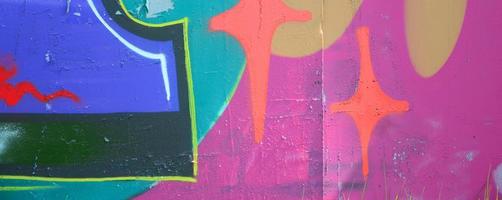 Street art. Abstract background image of a fragment of a colored graffiti painting in fashionable colors photo