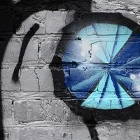 Street art. Abstract background image of a fragment of a colored graffiti painting in chrome and blue tones photo