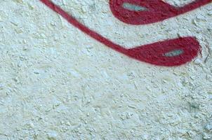 Street art. Abstract background image of a fragment of a colored graffiti painting in chrome and red tones photo