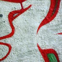 Street art. Abstract background image of a fragment of a colored graffiti painting in chrome and red tones photo