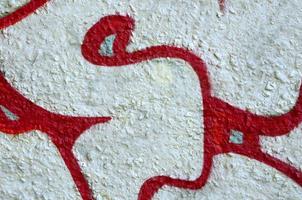 Street art. Abstract background image of a fragment of a colored graffiti painting in chrome and red tones photo