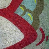 Street art. Abstract background image of a fragment of a colored graffiti painting in chrome and red tones photo