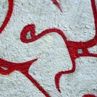 Street art. Abstract background image of a fragment of a colored graffiti painting in chrome and red tones photo