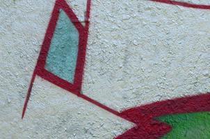 Street art. Abstract background image of a fragment of a colored graffiti painting in chrome and red tones photo