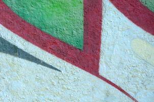 Street art. Abstract background image of a fragment of a colored graffiti painting in chrome and red tones photo