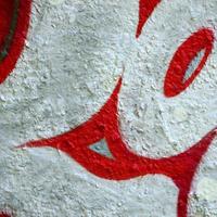 Street art. Abstract background image of a fragment of a colored graffiti painting in chrome and red tones photo