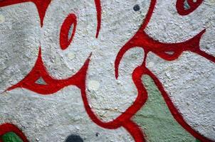 Street art. Abstract background image of a fragment of a colored graffiti painting in chrome and red tones photo