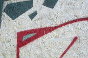 Street art. Abstract background image of a fragment of a colored graffiti painting in chrome and red tones photo