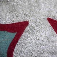 Street art. Abstract background image of a fragment of a colored graffiti painting in chrome and red tones photo