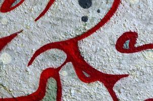 Street art. Abstract background image of a fragment of a colored graffiti painting in chrome and red tones photo