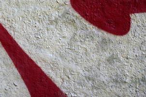 Street art. Abstract background image of a fragment of a colored graffiti painting in chrome and red tones photo