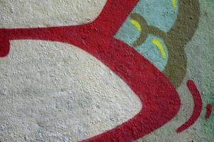 Street art. Abstract background image of a fragment of a colored graffiti painting in chrome and red tones photo