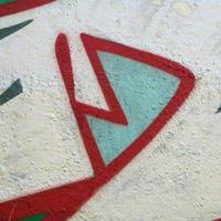 Street art. Abstract background image of a fragment of a colored graffiti painting in chrome and red tones photo