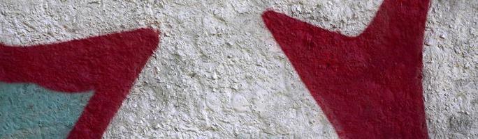 Street art. Abstract background image of a fragment of a colored graffiti painting in chrome and red tones photo