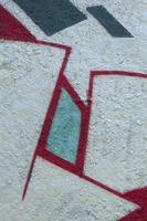 Street art. Abstract background image of a fragment of a colored graffiti painting in chrome and red tones photo