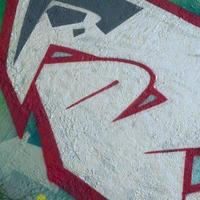 Street art. Abstract background image of a fragment of a colored graffiti painting in chrome and red tones photo