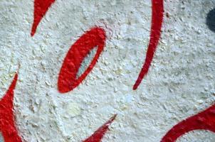 Street art. Abstract background image of a fragment of a colored graffiti painting in chrome and red tones photo