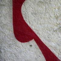 Street art. Abstract background image of a fragment of a colored graffiti painting in chrome and red tones photo