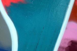 Street art. Abstract background image of a fragment of a colored graffiti painting in fashionable colors photo