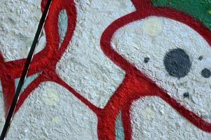 Street art. Abstract background image of a fragment of a colored graffiti painting in chrome and red tones photo