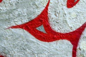 Street art. Abstract background image of a fragment of a colored graffiti painting in chrome and red tones photo