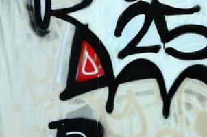 Street art. Abstract background image of a fragment of a colored graffiti painting in chrome and red tones photo