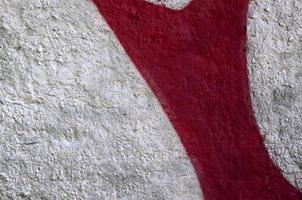 Street art. Abstract background image of a fragment of a colored graffiti painting in chrome and red tones photo