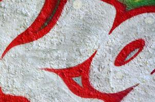 Street art. Abstract background image of a fragment of a colored graffiti painting in chrome and red tones photo