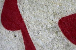 Street art. Abstract background image of a fragment of a colored graffiti painting in chrome and red tones photo