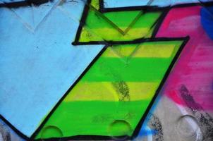 textura de un fragmento de la pared con pintura de graffiti, que se representa en él. una imagen de un dibujo de graffiti como una foto sobre temas de arte callejero y cultura de graffiti