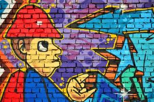 imagen detallada del dibujo de graffiti en color. fondo fondo de arte callejero con un personaje pintado. parte de la colorida obra maestra de los grafiteros profesionales foto