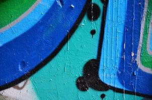 Detailed image of color graffiti drawing. Background street art picture photo