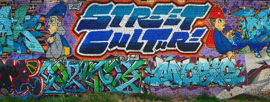 A detailed image of the graffiti drawing. A conceptual street art background with a colorful letter graffiti with word Street culture and Music photo