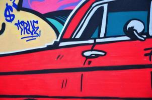 una imagen detallada del dibujo de graffiti. un fondo de arte callejero conceptual con un auto lowrider rojo foto