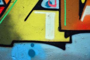 Art under ground. Beautiful street art graffiti style. The wall is decorated with abstract drawings house paint. Modern iconic urban culture of street youth. Abstract stylish picture on wall photo