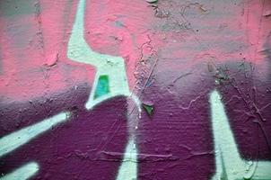 Art under ground. Beautiful street art graffiti style. The wall is decorated with abstract drawings house paint. Modern iconic urban culture of street youth. Abstract stylish picture on wall photo