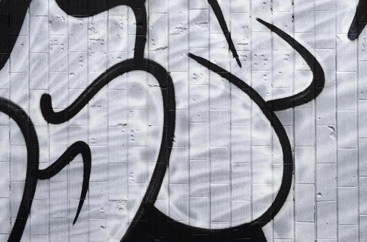 un fragmento de un patrón de graffiti, aplicado a una pared de azulejos fríos, que está cubierta con un fino condensado. el concepto de arte callejero en un clima inapropiado foto