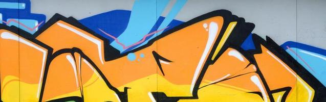 Fragment of colored street art graffiti paintings with contours and shading close up photo