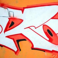 Fragment of colored street art graffiti paintings with contours and shading close up photo