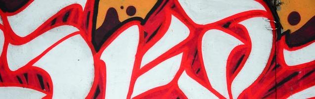 Fragment of colored street art graffiti paintings with contours and shading close up photo