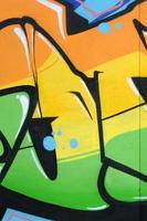 Fragment of colored street art graffiti paintings with contours and shading close up photo