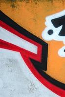 Fragment of colored street art graffiti paintings with contours and shading close up photo