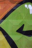 Fragment of colored street art graffiti paintings with contours and shading close up photo