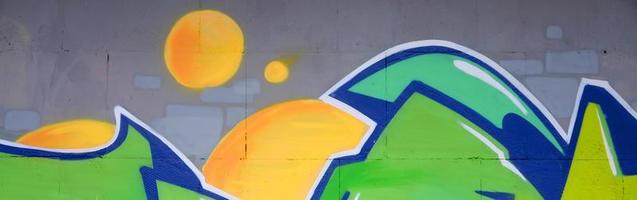 Fragment of colored street art graffiti paintings with contours and shading close up photo