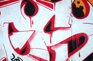 Fragment of colored street art graffiti paintings with contours and shading close up photo