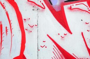 Fragment of colored street art graffiti paintings with contours and shading close up photo